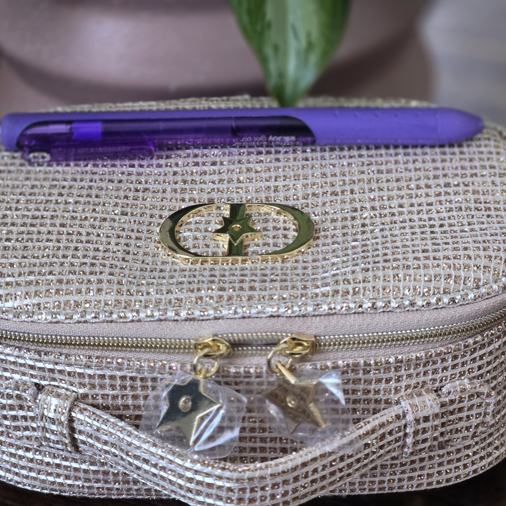 Dior Gold Cosmetic Bag with Star Charms